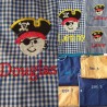 Service de broderie sur tablier d'écolier