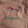 Service de broderie sur tablier d'écolier