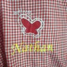 Service de broderie sur tablier d'écolier