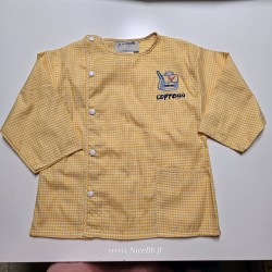 Service de broderie sur tablier d'écolier