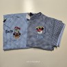 Service de broderie sur tablier d'écolier